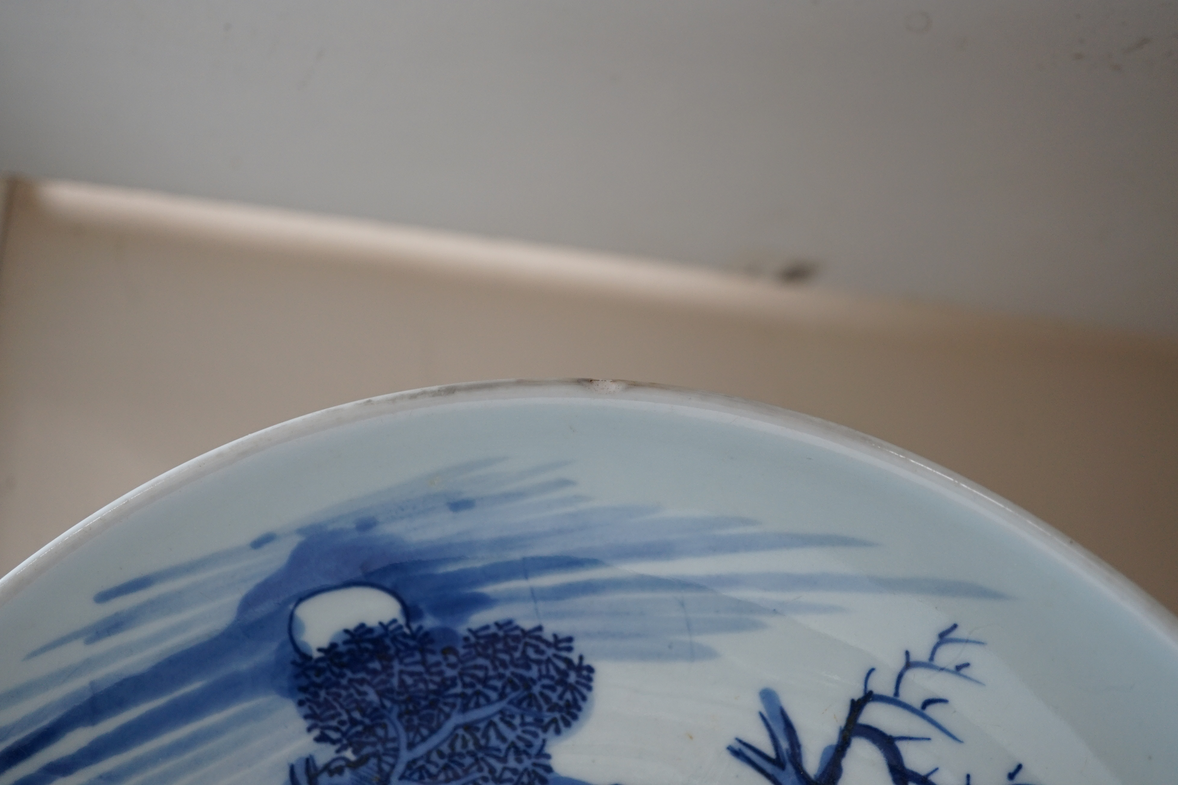 A large Chinese blue and white ‘mythical beasts’ saucer dish, Yongzheng period